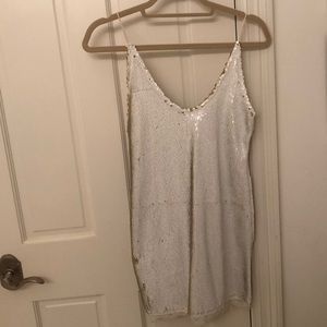 White and gold sparkly mini dress